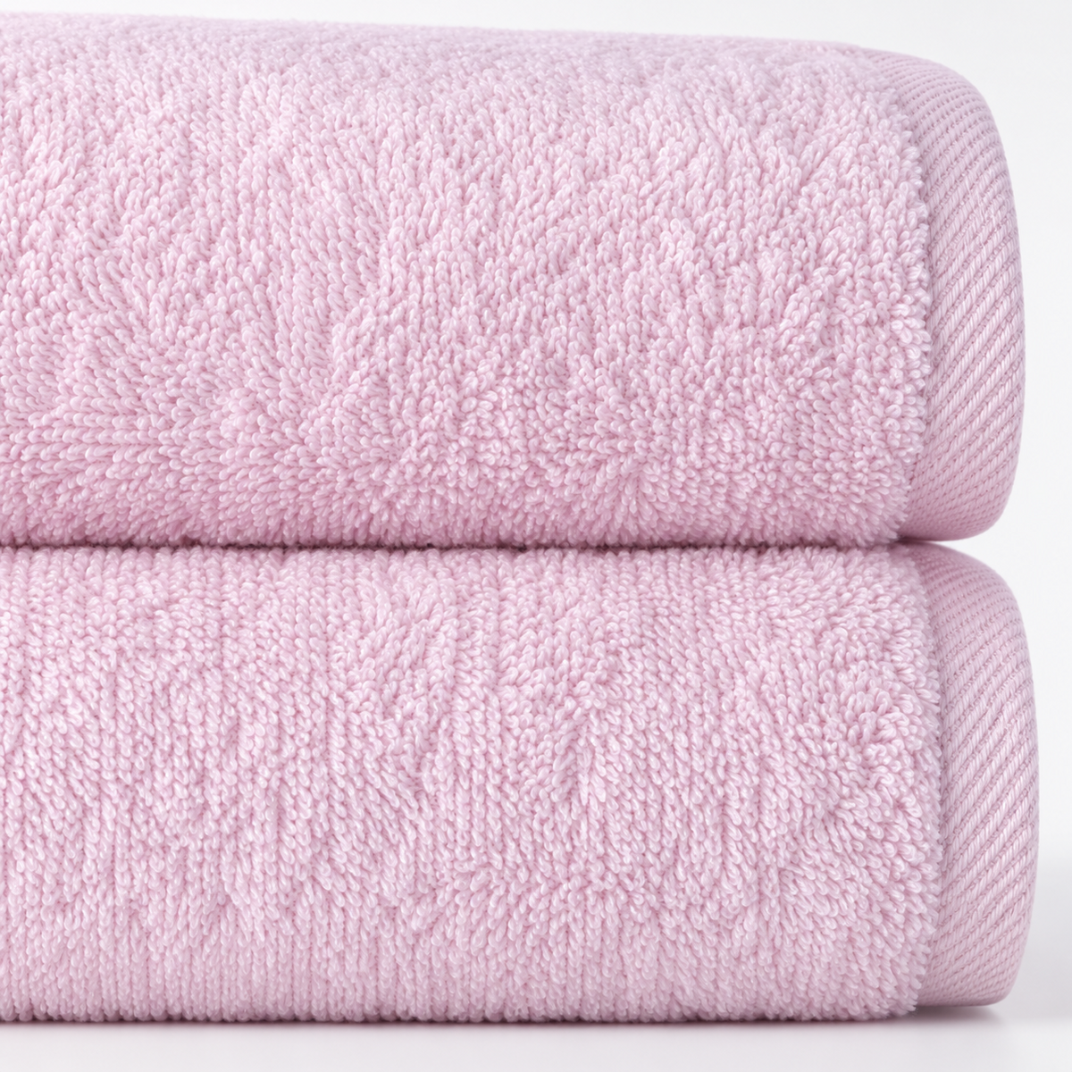 Close-up texture of soft pink SALBAKOS 100 percent cotton baby towel